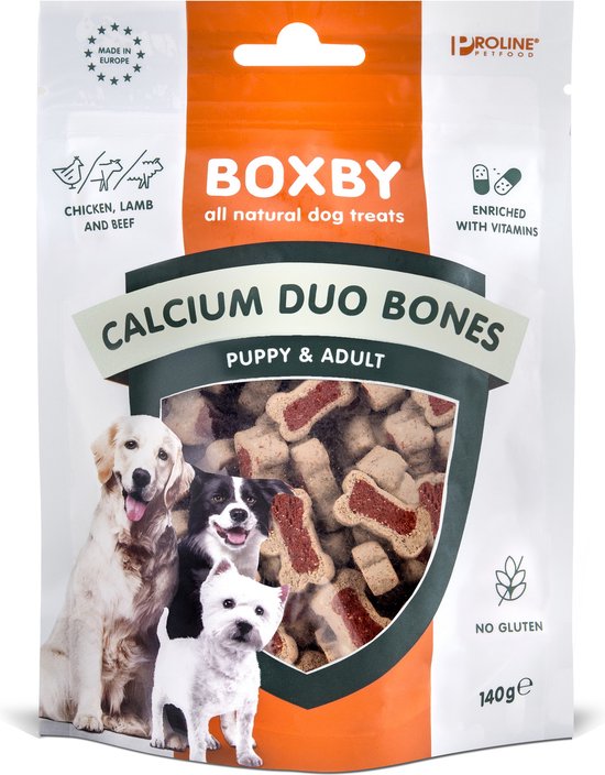 Zak "BOXBY all natural dog treats", calcium duo bones, puppy & adult. Met afbeeldingen van drie honden en de snacks.
