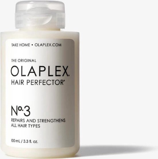 Witte fles Olaplex Hair Perfector No.3 met een fliptopdop. Tekst op de fles: 'THE ORIGINAL OLAPLEX HAIR PERFECTOR N°.3 REPAIRS AND STRENGTHENS ALL HAIR TYPES'.