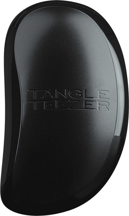 Zwarte Tangle Teezer haarborstel met deukje in het handvat voor grip.