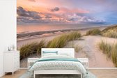 Behang - Fotobehang Strand - Zee - Duin - Nederland - Roze - Breedte 525 cm x hoogte 350 cm