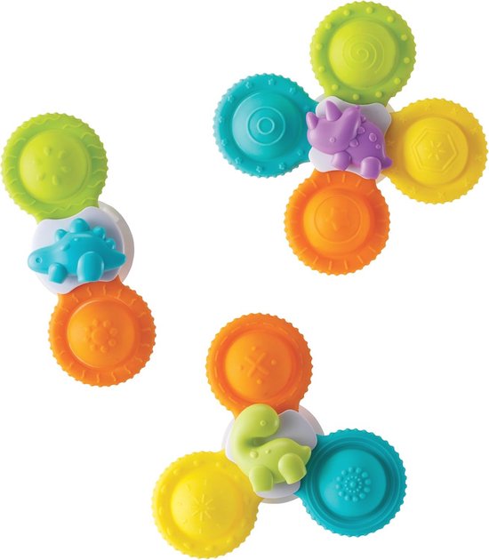 Trois jouets spinner dinosaures bleus, verts et violets, avec des roues jaunes, orange, vertes et cyan.