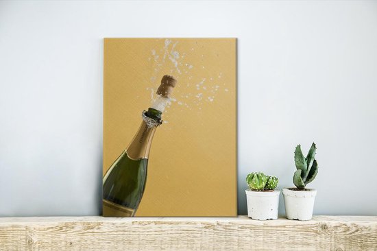 Un bouchon qui saute d'une bouteille de champagne 40x60 cm - impression  photo sur