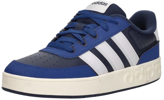 Kwarts view van een donkerblauwe Adidas sneaker met kobaltblauwe en witte accenten.