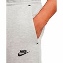 Close-up van een grijze Nike joggingbroek met een zwart Nike logo.