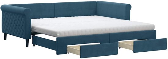 Blauwe slaapbank met matras, uitgetrokken lades en ruitpatroon op de armleuningen.