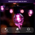Eén ronde lamp van een lichtsnoer met roze licht en waterdruppels, bestendig tegen weer.