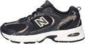 Zwarte New Balance U530 sneaker met luipaardprint en beige details.
