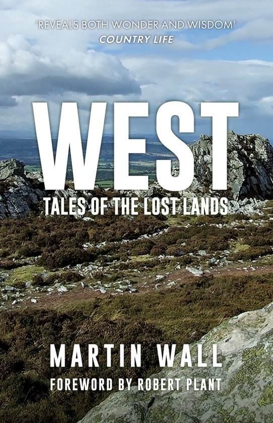 Couverture du livre 'WEST TALES OF THE LOST LANDS' par Martin Wall, représentant un paysage accidenté et de bruyère sous un ciel dramatique.