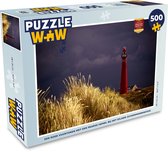 Puzzel Een rode vuurtoren met een paarse hemel bij het eiland Schiermonnikoog - Legpuzzel - Puzzel 500 stukjes