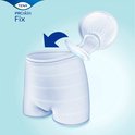 TENA ProSkin Fix Fixation Pant met pijl die een inlegger naar het broekje leidt.