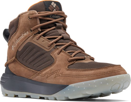 Bruine Columbia mid-top sneaker, zijkant aanzicht. Met veters, mesh en suède details. Lichtgrijze en donkergrijze zool.