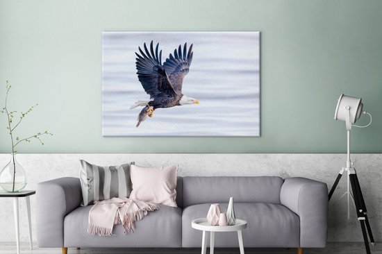 Tableau sur toile Aigle avec poisson au dessus de l'eau - 120x80 cm - Décoration murale