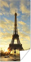 Poster De Eiffeltoren met een unieke oranje lucht door de laagstaande zon - 60x120 cm