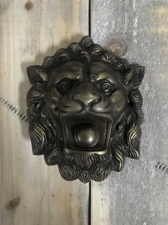 Sonnette en laiton en tête de lion, bouche ouverte avec un bouton de sonnette.