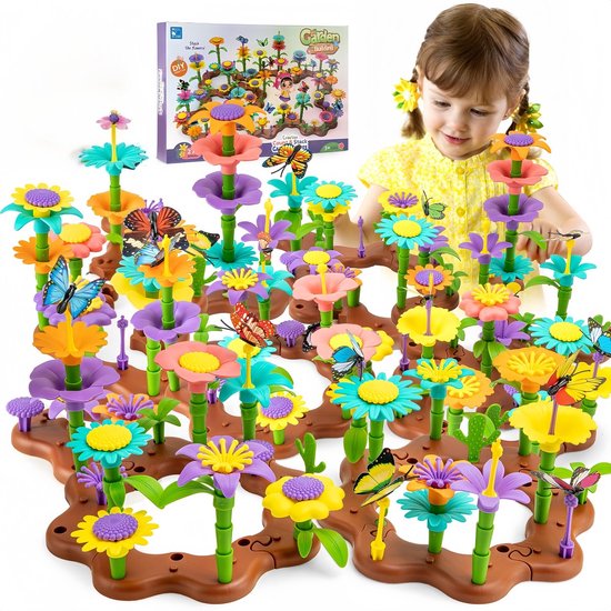 Une fille joue avec un grand jardin de fleurs aux couleurs vives, des papillons et des libellules. La boîte est visible.