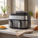 Philips 5000 serie dubbele heteluchtfriteuse met roestvrijstalen voorpaneel en twee mandjes.