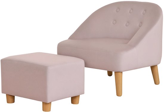Roze kinderfauteuil en poef met houten poten, op witte achtergrond.