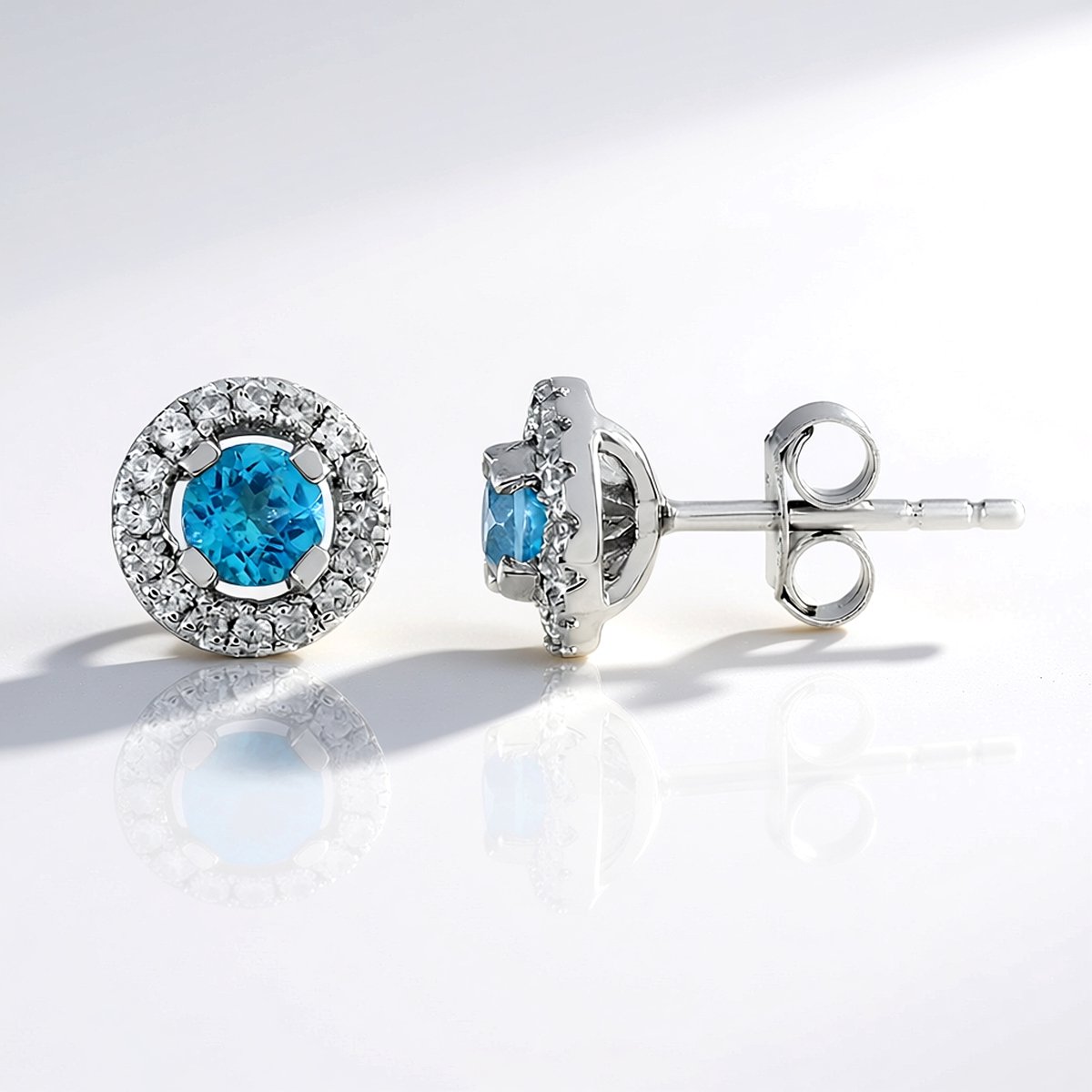 Cavill - Zilveren Oorbellen - 925 Sterling Zilver Platina Verguld - Paraiba Blauwe Topaas 0,657 ct - Rond 8 mm - Zirkonia 0,279 ct - Elegant