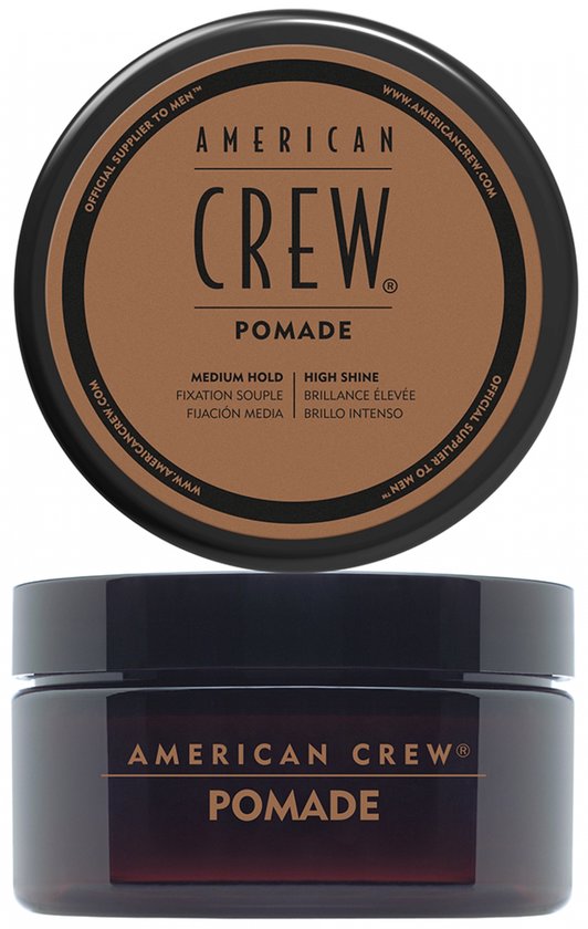 Deux pots American Crew Pomade, dont un ouvert révélant la pommade verte, l'autre fermé.