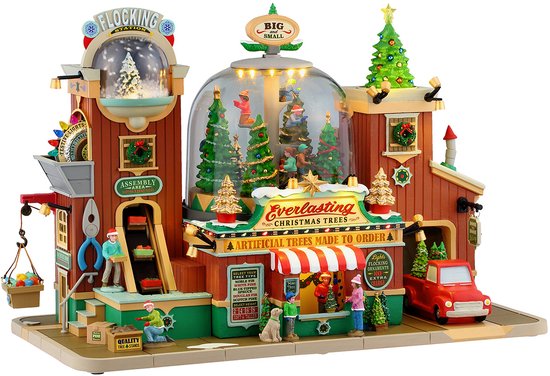 Village de Noël avec le bâtiment Everlasting Christmas Trees, personnages mobiles et sapins dans une grande sphère de verre. Les panneaux indiquent 'Flocking Station' et 'Artificial Trees Made to Order'.