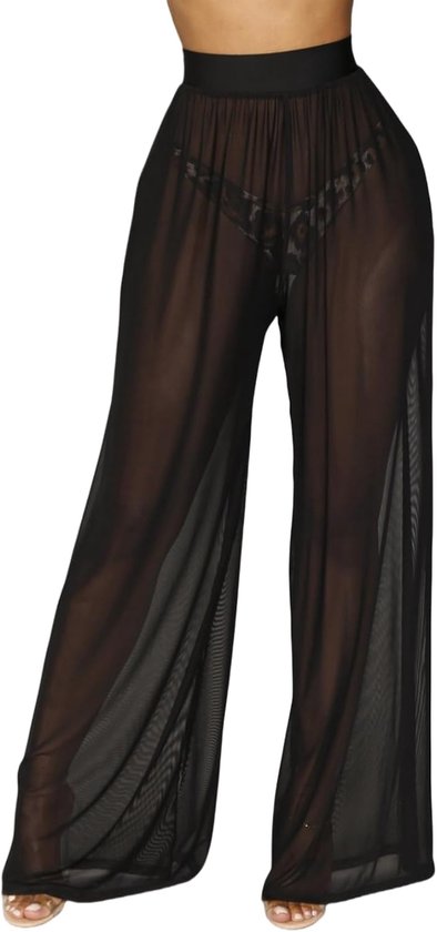 Modèle portant un pantalon noir en résille transparente à jambes larges sur un slip léopard.