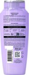 Achterkant paarse fles L'Oréal Elvive Hydra Hyaluronic shampoo met productinformatie.