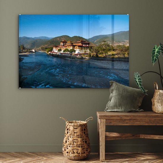 Punakha Dzong à côté d'une large rivière peu profonde au Bhoutan Plexiglas 90x60 cm - Tirage photo sur Glas (décoration murale en plexiglas)