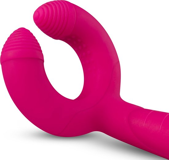 Gedetailleerd beeld van de roze, gebogen vibrator met ribbelige uiteinden.