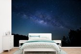 Behang - Fotobehang de Melkweg vanaf aarde - Breedte 390 cm x hoogte 260 cm