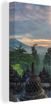 Canvas Schilderij Zonsopgang bij de tempel Borobudur in Indonesië - 20x40 cm - Wanddecoratie