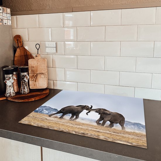 KitchenYeah® Inductie beschermer 65x52 cm - Olifant - Dieren - Vlakte - Natuur - Kookplaataccessoires - Afdekplaat voor kookplaat - Inductiebeschermer - Inductiemat - Inductieplaat mat