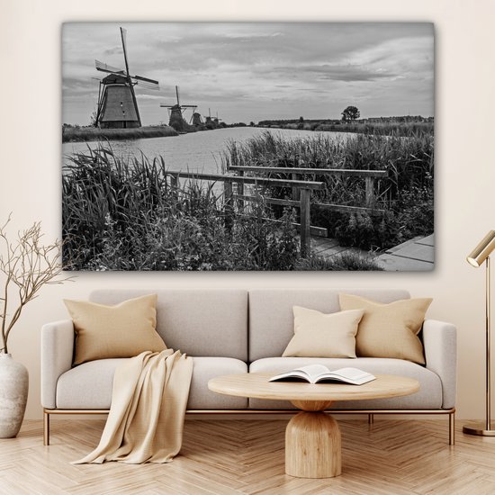 Photo Zwart et blanc des moulins à vent de Kinderdijk aux Nederland Toile 180x120 cm - Tirage photo sur toile (Décoration murale salon / chambre) XXL / Groot format!
