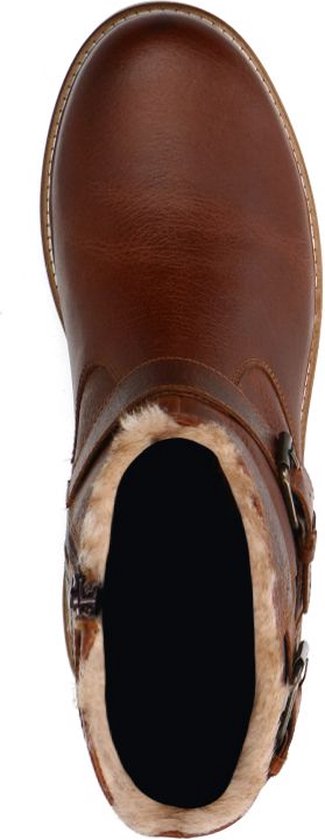 Botte en cuir marron avec doublure en fourrure et boucles.