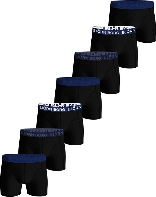 Sept boxers noirs empilés, chacun avec une ceinture bleu marine 'Björn Borg'.