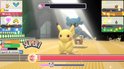 Pikachu en twee andere wezens op een podium met veel licht en sterren.