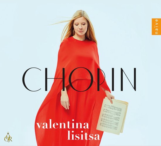 Valentina Lisitsa in een rode jurk met grote mouwen, met bladmuziek.