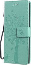 Mobigear Telefoonhoesje geschikt voor Sony Xperia 10 II Hoesje | Mobigear Tree Bookcase Portemonnee | Pasjeshouder voor 2 Pasjes | Telefoonhoesje voor Pinpas / OV Kaart / Rijbewijs - Turquoise