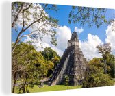 Canvas Schilderij Tikal tempel I in de Maya stad Guatemala - 120x80 cm - Wanddecoratie