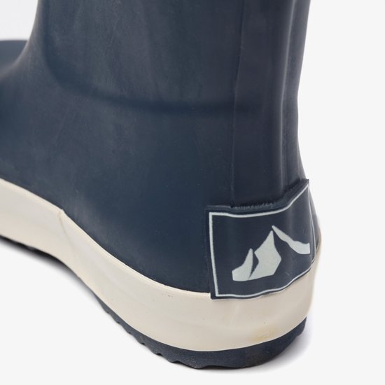 Botte de pluie bleu foncé avec arrière beige et logo de montagne.