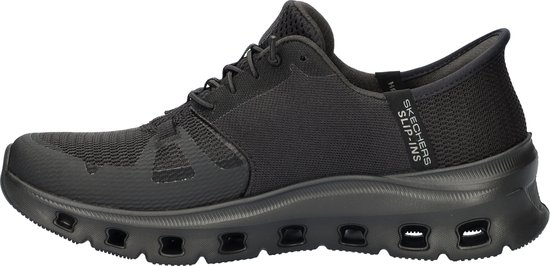 Zijprofiel van een zwarte 'Skechers Slip-Ins' sneaker met mesh en open zool.