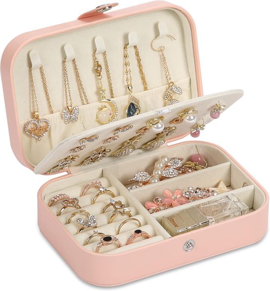 Roze juwelendoos met veel sieraden: kettingen, ringen, oorbellen en armbanden. Met haakjes, ringhouders en compartimenten.