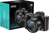 Zwarte KIEKZ digitale camera met 16x zoom, 8K Ultra HD en Dual Cameras. De doos toont de camera en de verpakking.