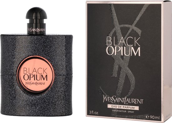 Zwarte flacon met glitterafwerking naast de bijpassende zwarte doos met 'BLACK OPIUM'.
