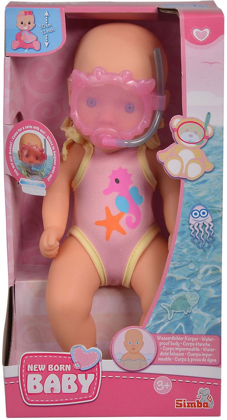 Baby pop in roze badpak met zeepaardje, met duikbril en snorkel, in gesloten verpakking met zwemdecoratie.