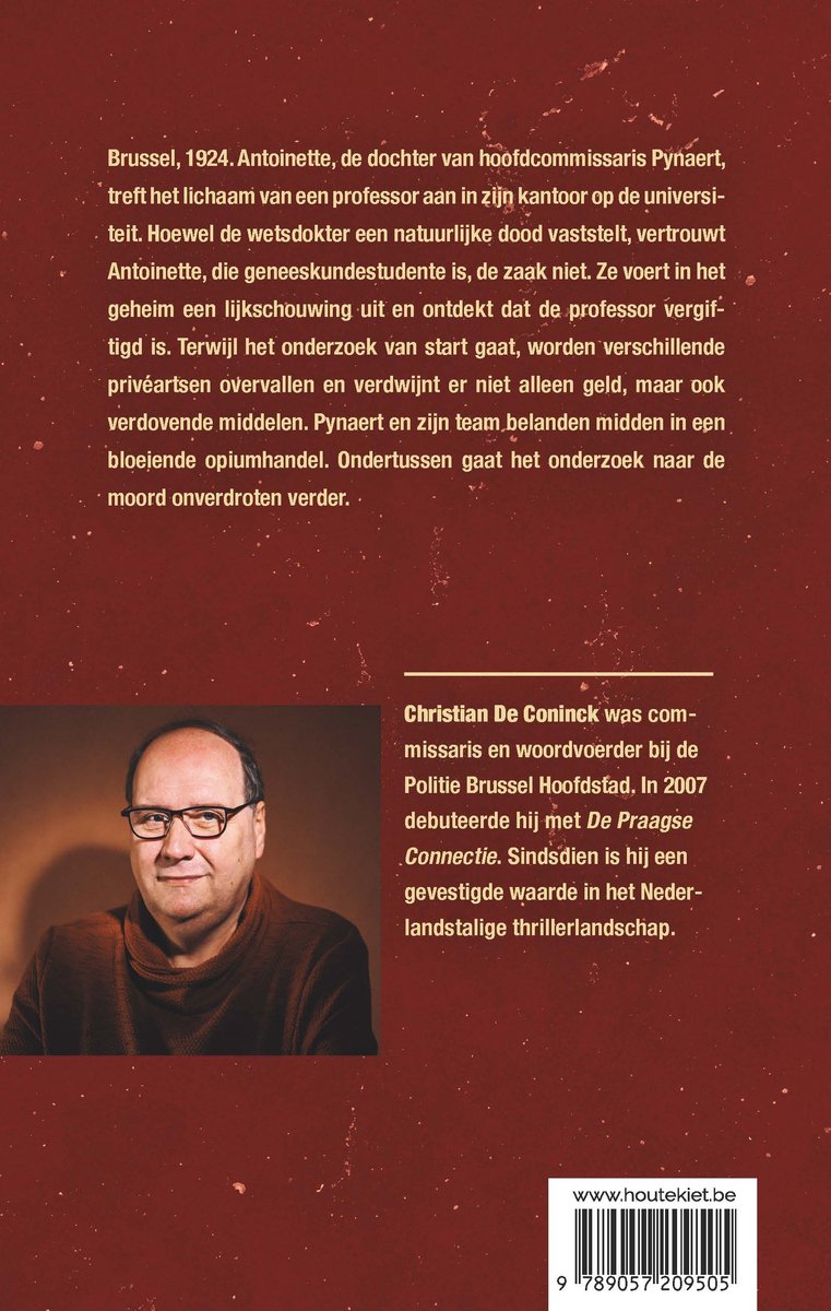 Portret van Christian De Coninck, auteur van 'Dodenmasker', met een bruine trui.