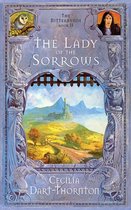 Boekomslag met de titel 'The Lady of the Sorrows'. Een kasteel in de verte en een portret van een vrouw bovenaan.