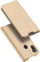 Hoesje geschikt voor Samsung Galaxy A11 - dux ducis skin pro book case - goud