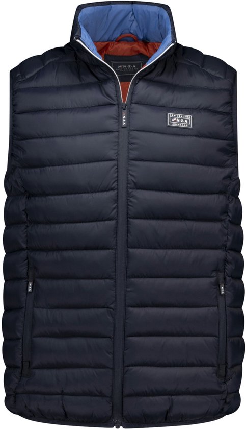 Donkerblauwe gewatteerde bodywarmer, open met een rode voering en blauwe kraag. Met Patch 'New Zealand Auckland'.