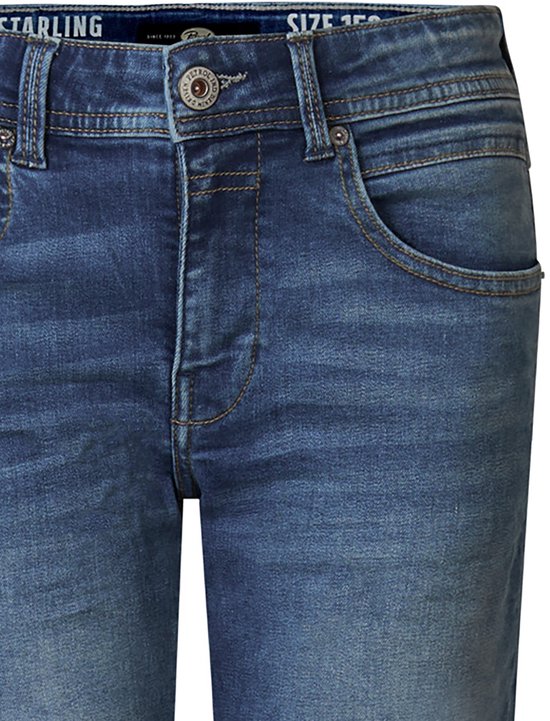 Blauwe Petrol Industries jeans met koperen knoop, contrasterende stiksels en tailleband met STARLING en SIZE 152 label.