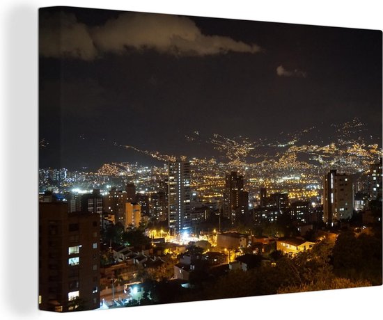 Canvas Schilderij De skyline van Medellin in de avond in het Zuid-Amerikaanse Colombia - 140x90 cm - Wanddecoratie
